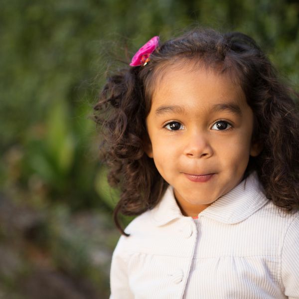A young girls looking into the camera