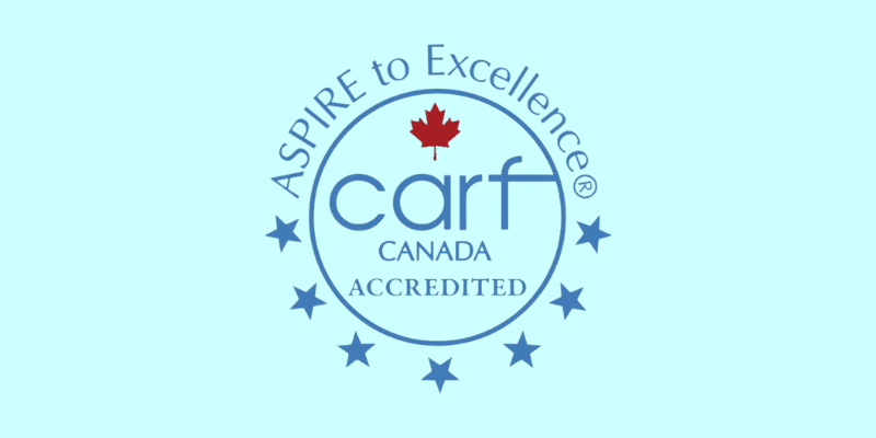CARF logo - inclusion powell river